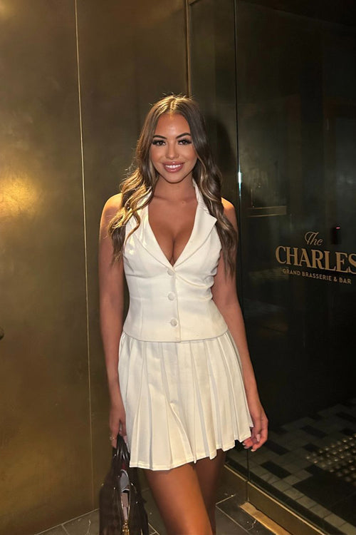 White Sleeveless Pleated Skirt Suit