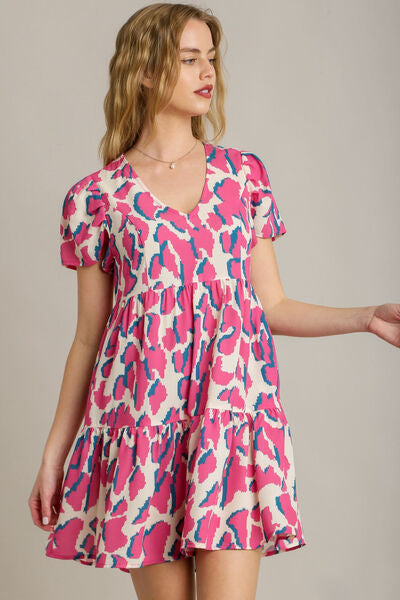 Full Size Abstract Print Pleat Detail Short Sleeve V-Neck Tiered Dress Plus Size